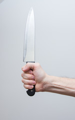 hand holding big knife