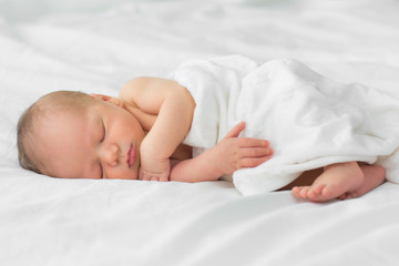 Newborn baby sleeping on a blanket. Age 1 week - 159212155