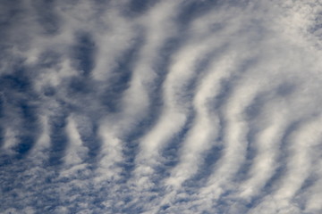 Fototapeta na wymiar Clouds against the blue sky background