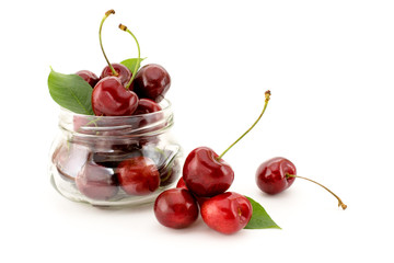 Cherries in a jar isolated