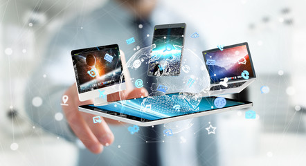 Businessman connecting tech devices to each other 3D rendering