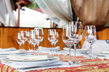 Table served with dishes, close up