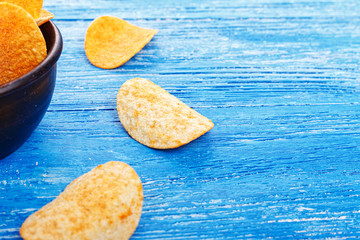 potato chips in a clay plate