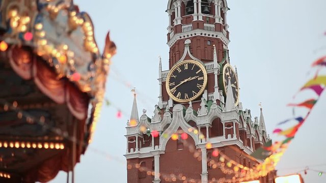 Moscow. Christmas. Entertaining attractions at the Kremlin. People in the booths are attracted by balloons. New Year theme.