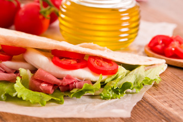 Piadina with ham and lettuce. 
