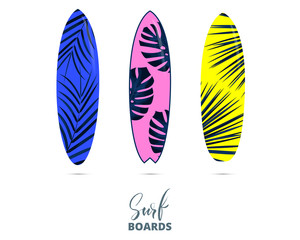 Surfboards. Colorful surfing equipment with trendy botanical tropical patterns and lettering