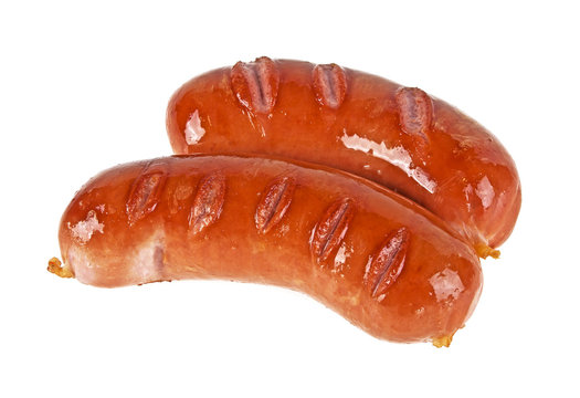 Two smoked sausages on a white background