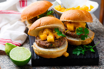 turkey burgers with mango salsa .selective focus
