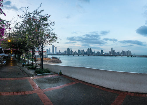 Paseo de Las Bovedas waterfront esplanade and city Skyline - Panama City, Panama