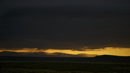 Fototapeta premium Rain storm over Pebble island, Falklands