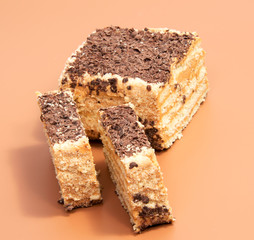 biscuit Swiss roll isolated on brown background