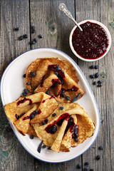 Ruddy pancakes with fresh honeysuckle
