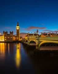 View of the Houses of Parliament and Westminster Bridge in London at night