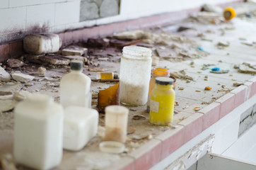 Fototapeta na wymiar Abandoned chemical laboratory colorful Broken poison bottles