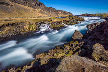 Fototapeta na wymiar Roadside rapids near Foss a Sidu, Iceland