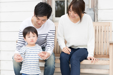 young asian family relaxing