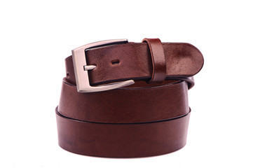 Belt male leather.The fashionable accessory is twisted on a white background.With a metal buckle.Natural animal skin.