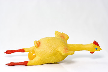 Rubber chicken laying an egg...Just the yolk, folks.