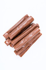 Chewy chocolate logs isolated on a white background