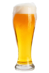 A glass of cold beer with foam, clipping path, bubbles in a drink, on a white background, isolated