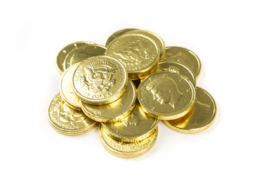 Chocolate gold coins isolated on a white background