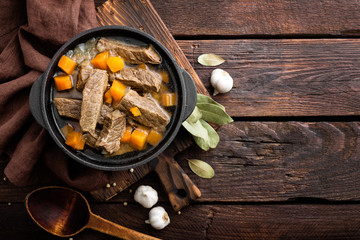 Delicious braised beef meat in broth with vegetables, goulash - obrazy, fototapety, plakaty