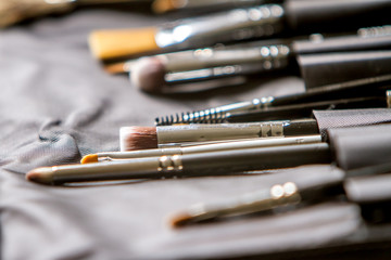 Makeup brushes, makeup artist working station