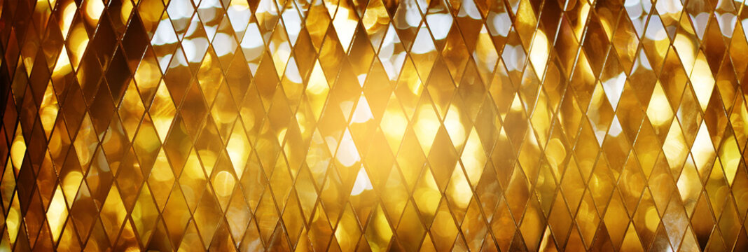 Shining golden mosaic glass background © ipopba