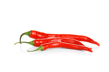 Chili peppers on white background. Aphrodisiac food for increasing sexual desire