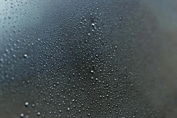 Drops on tinted window as a background
