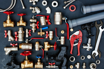 Top view of the plumbing equipment on a black background