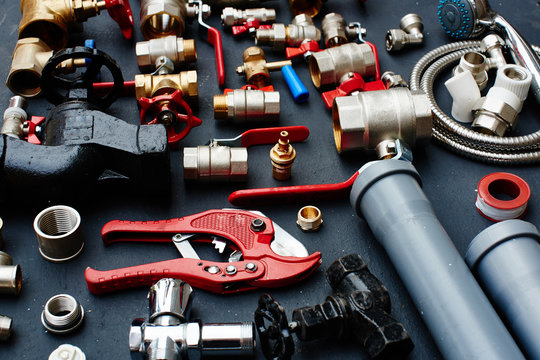 Plumbing equipment on a black background