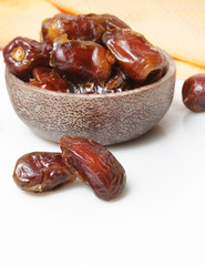 Dried dates in small bowl