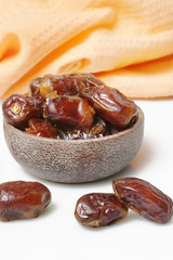 Dried dates in small bowl