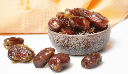Dried dates in small bowl