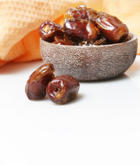 Dried dates in small bowl