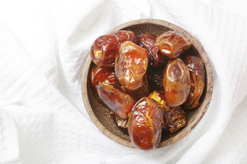 Dried dates in small bowl