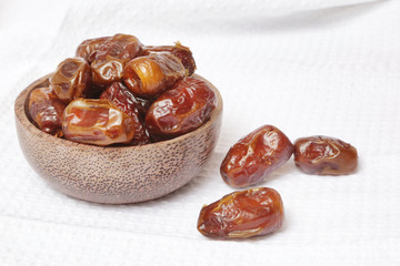 Dried dates in small bowl