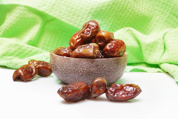 Dried dates in small bowl