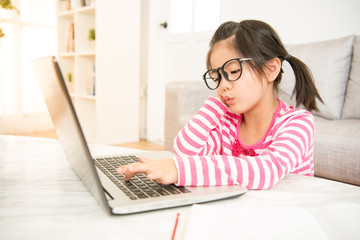 girl feel bored to using her computer