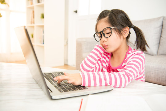 Girl Feel Bored To Using Her Computer