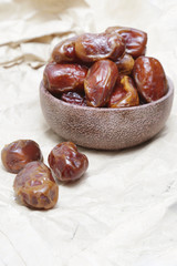 Dried dates in small bowl 