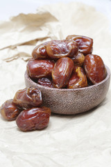 Dried dates in small bowl