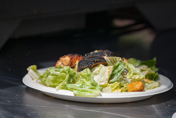 Smoked Salmon Steak and Salad Served at Local food truck festival