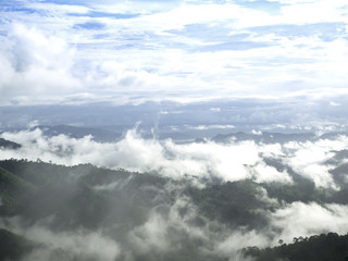 Fog and clouds above the mountains in rainy season at Thailand.