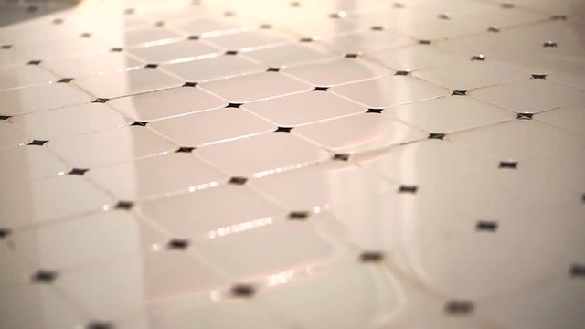 Shiny octagon White and Black dot floor tiling house interior 