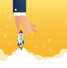big hand holding a rocket startup business concept  