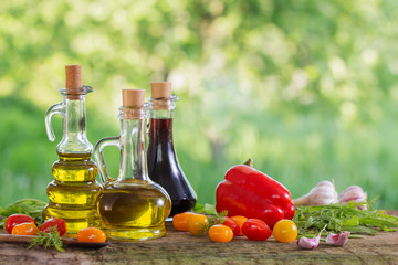 vegetables with oil on wooden table outdoor