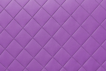 detail of purple sewn leather, pink leather upholstery background pattern