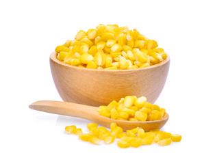 sweet corn in wooden bowl and spoon isolated on white background